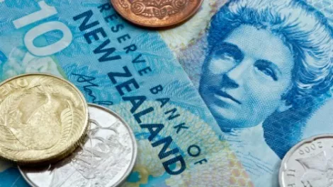 NZ dollar falls after prices decline at global dairy auction